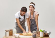 Steps to Plan a Memorable Cooking Class Date Night Couple at a cooking class date night | Concept