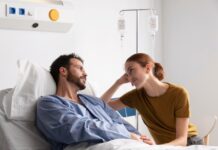 How to Support a Loved One Diagnosed with Mesothelioma Wife sitting with sick husband | Concept for supporting a loved one diagnosed with Mesothelioma