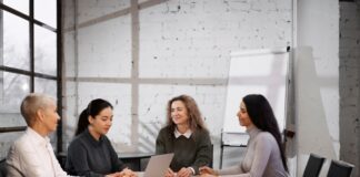 Women in an office meeting | Women's Mental Health Concept